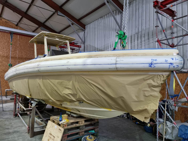 A yacht tender being refit